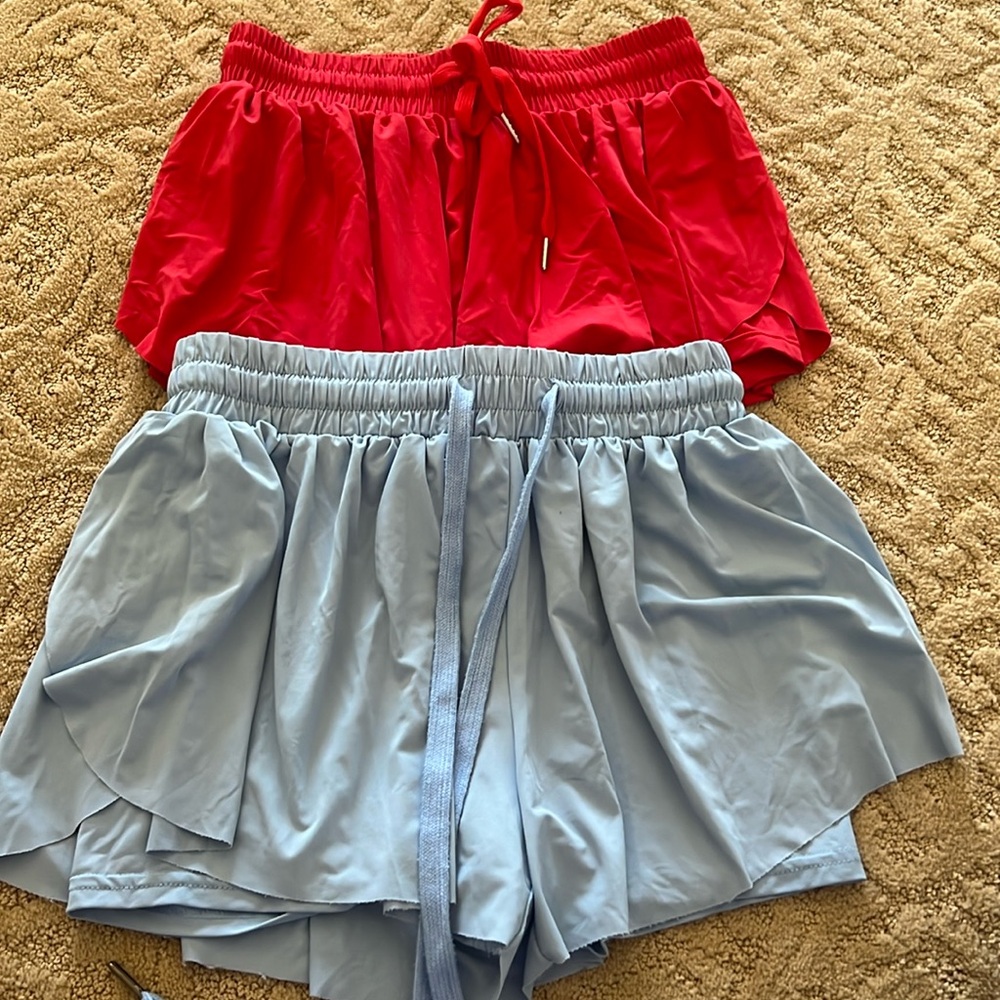 Two pairs of flowy shorts size small. Excellent condition for $15 each for $29